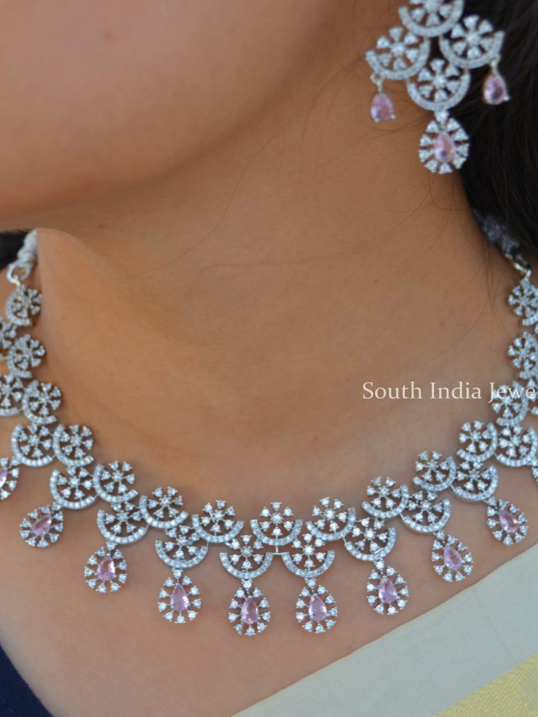 Gorgeous Pale Pink Rodium Polish Necklace. This is a beautiful necklace suitable for all kinds of attires. Shop more Gorgeous Pale Pink Rodium Polish Necklace at South India Jewels.