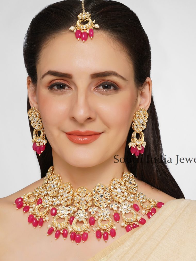 Gorgeous Pink Stones Handcrafted Kundan Brass Necklace Set With Tika