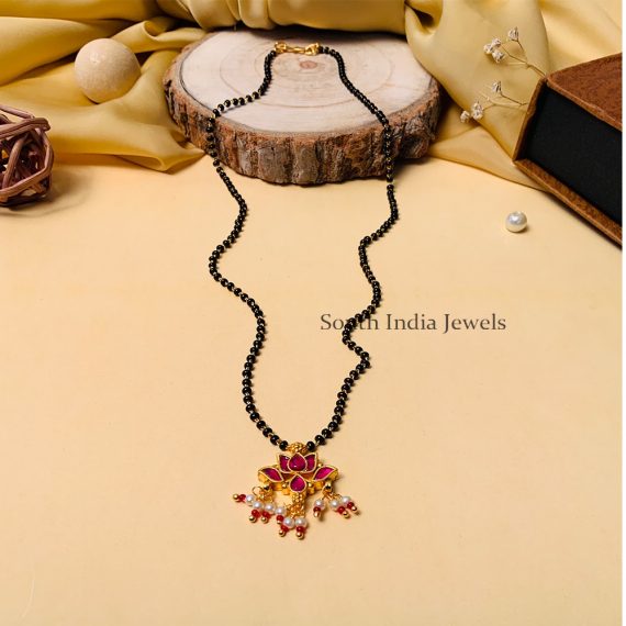 Charming Gold Plated Ahmedabadi Jadau Pachi Polki Kundan Lotus Mangalsutra