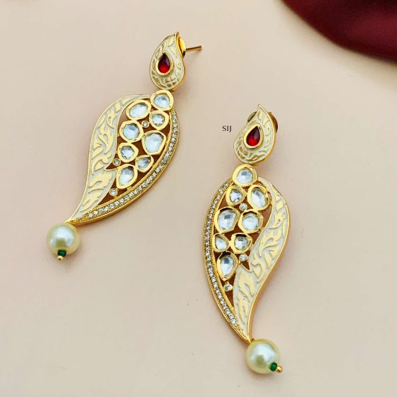 Gold Finish Yellow Earrings with Kundan with Red Stone