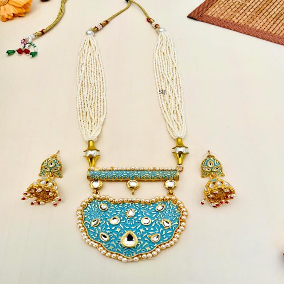 Multi Layers Pearl Beaded Haram with Kundan Studded Blue Pendant