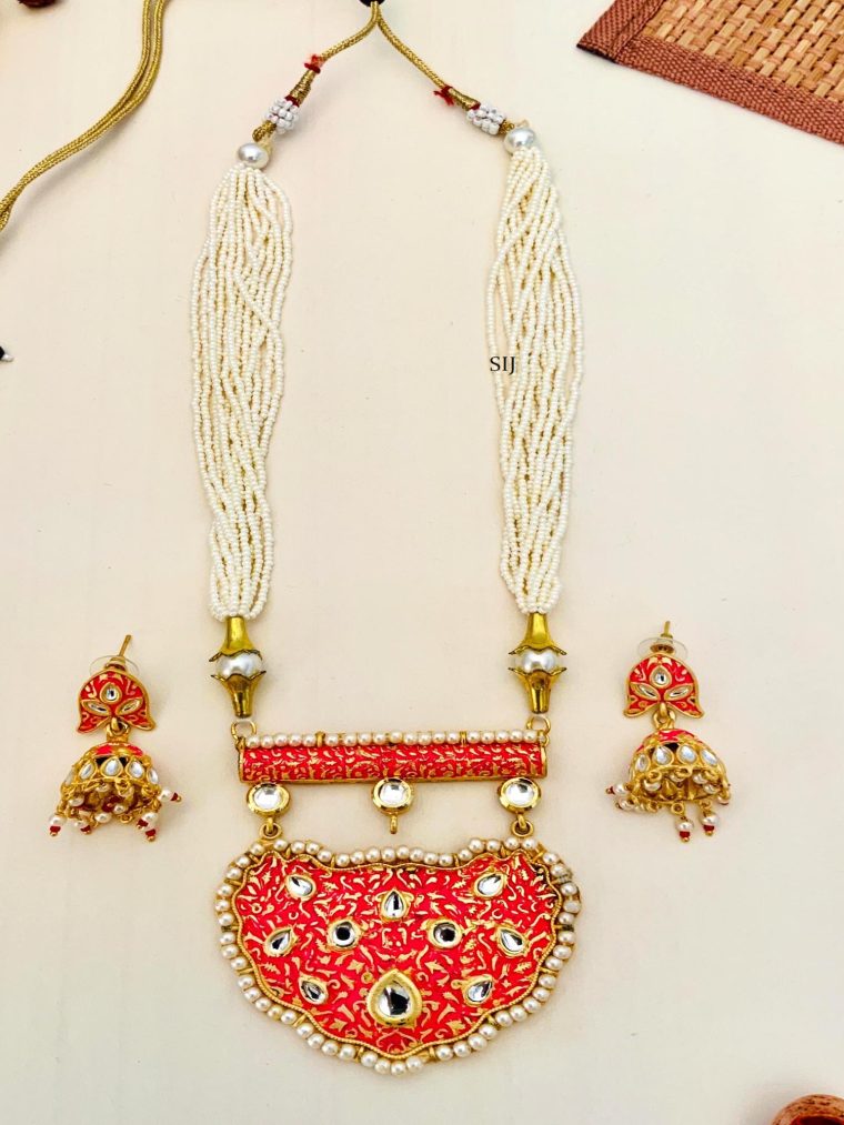 Multi Layers Pearl Beaded Haram with Kundan Studded Orange Pendant