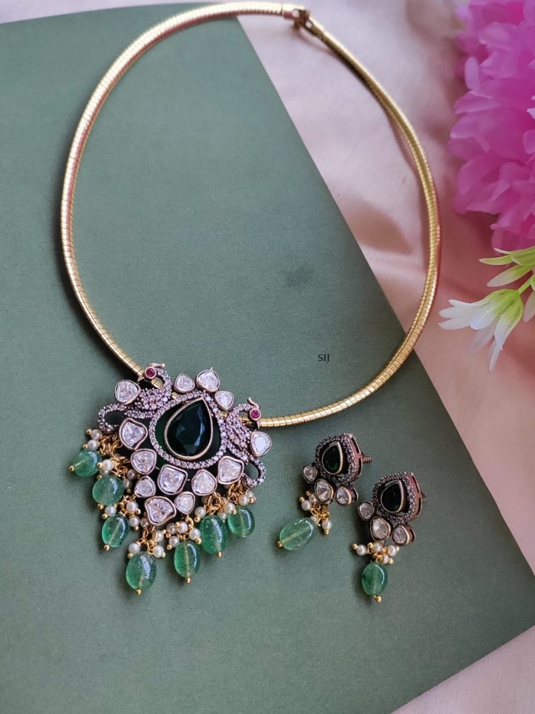 Gold Plated Hasli Necklace with Kundan Dual Peacock Pendant