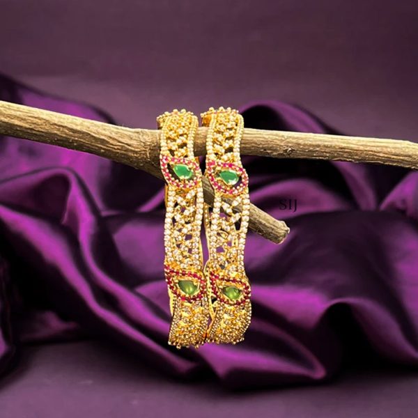 Traditional Gold Look Alike AD Stone Wavy Bangles