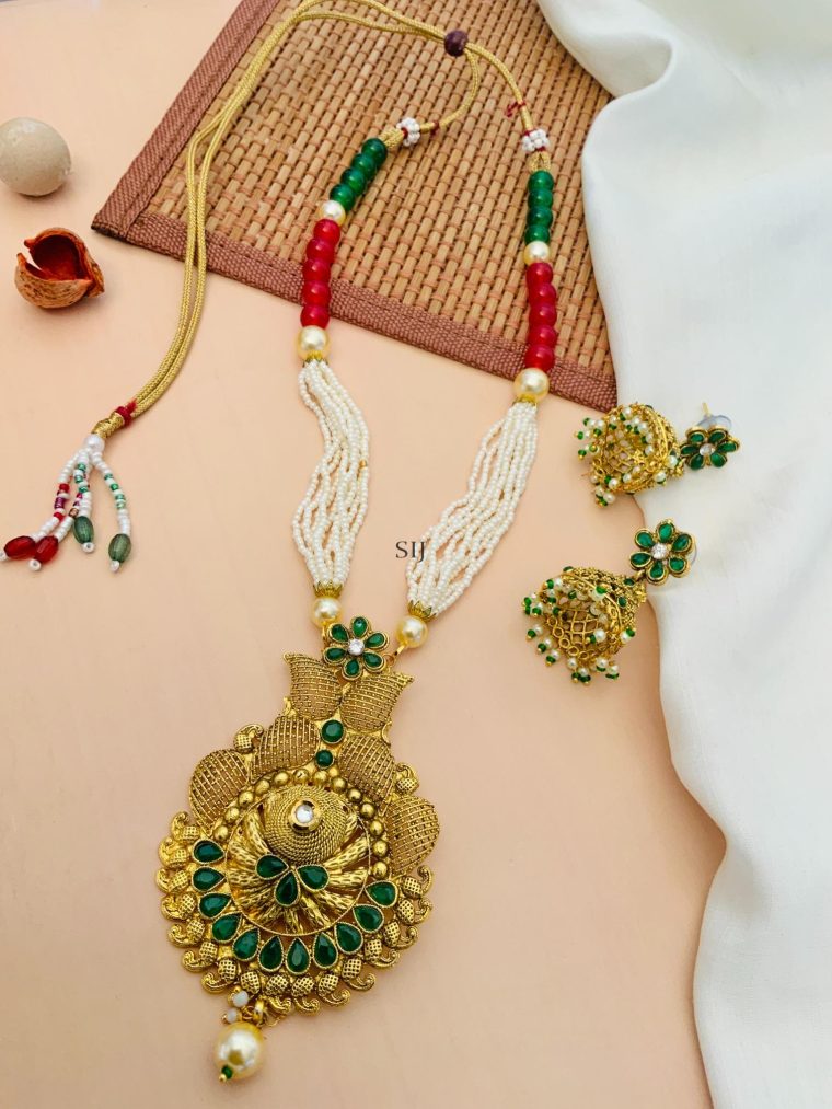 Artificial Pearl And Green Kundan Necklace With Jhumkas