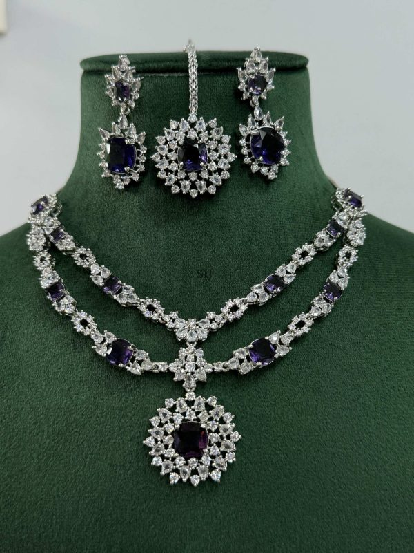 Silver Plated Flower Design Blue Stone AD Necklace With Earrings And Maang Tikka